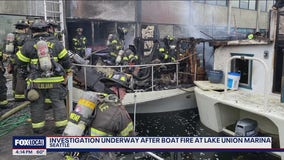 Heavy plume of smoke visible in Seattle after houseboats catch fire on Lake Union