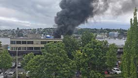 Heavy plume of smoke visible in Seattle after boats catch fire on Lake Union