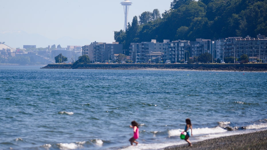 kids playing on alki beach