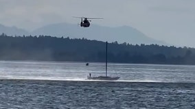 VIDEO: Man and dog rescued from vessel stranded in Samish Bay